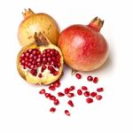 Whole And Halved Pomegranate Stock Photo