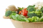 Wooden Bowl Of Mixed Salad Stock Photo