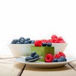 Green Tea Matcha Mousse Cake With Berries Stock Photo