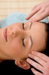 High Angle View Of Woman Taking Head Massage On White Background Stock Photo