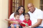 Happy African Family In Their New House Stock Photo