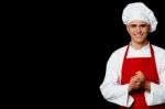 Young Male Chef Posing In Uniform Stock Photo