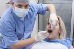 Dentist Anesthetizing Patient Stock Photo