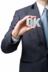 Businessman Showing Ok Sign Stock Photo