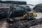 Mechanical Digger Clearing Clearing A River Outlet Stock Photo