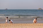 Asian Mom And Son On Beach Stock Photo