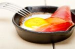 Egg Sunny Side Up With Italian Speck Ham Stock Photo