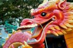 Plastic Model Of A Dragon In A Singapore Street Stock Photo