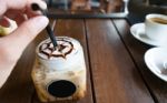 Coffee, Iced Coffee Mocha On Table Wood Background In Cafe Stock Photo