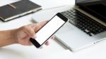 Hand Use Phone Blank Screen Top View In Office Morning Light Stock Photo