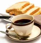 Bread And Coffee Means Meal Time And Black Stock Photo