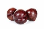 Red Plum Fruit Isolated On The White Stock Photo