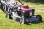 Modern Gasoline Lawn Mower Stock Photo