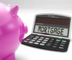 Mortgage Calculator Shows Purchase Of Home Loan Stock Photo