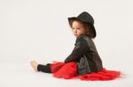 Little Girl Fashion Model With Black Hat Stock Photo