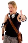 Male Student Showing Thumbs Up Stock Photo