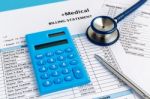 Health Care Cost Concept With Calculator Stock Photo