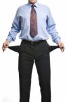 Businessman Showing Empty Pockets Stock Photo