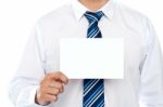 Businessman Showing Blank Card Stock Photo