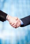 Business People Shaking Hands Stock Photo