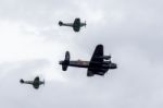 Avro Lancaster Flanked By Two Spitfires Stock Photo