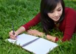 Pretty Women  Writing Book Stock Photo