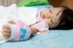 Baby Have Diarrhea And Sleep On A Bed In Hospital With Saline In Stock Photo