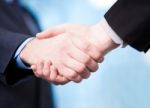 Successful Businessmen Shaking Hands Stock Photo