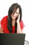 Lady With Laptop And Phone Stock Photo