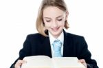 Cute Business Girl Studying A Book Stock Photo