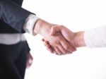 Handshaking Female Hands On White Stock Photo