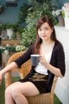 Portrait Of Thai Adult Women Office Beautiful Girl Drinking Coffee Stock Photo