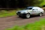 A. Tracey Driving Toyota Corolla Stock Photo