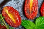 Baked Cherry Tomatoes With Basil Anf Thyme Stock Photo