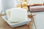 Bread In Plate On Wooden Stock Photo