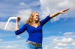 Young Caucasian Woman Throwing Boomerang Stock Photo