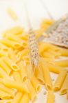 Italian Pasta Penne With Wheat Stock Photo