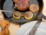 Pork Chop Seared On Iron Skillet Stock Photo