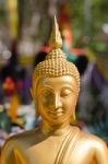 Face Of Golden Buddha Sculpture, Thailand Stock Photo