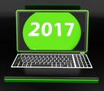 Two Thousand And Seventeen On Laptop Shows New Year Resolution 2 Stock Photo