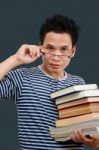 Man Holding Books Stock Photo