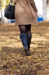 Portrait Of Beautiful Girl Walking In Autumn Stock Photo