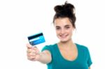 Young Lady Holding Credit Card Stock Photo