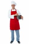 Isolated Young Male Chef Posing Stock Photo