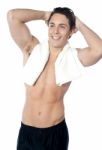 A Young Man With A Towel Stock Photo