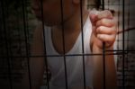 Focus At Boy Hand Catch The Cage, Imprison Child, Kidnap Stock Photo