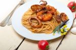 Italian Seafood Spaghetti Pasta On Red Tomato Sauce Stock Photo