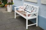 Wooden Bench Outside A House In Rothenburg Stock Photo