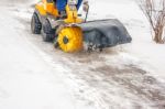 Man Cleans Snow Machines Stock Photo