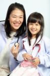 Doctor Checked Children Girl's Body Stock Photo